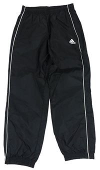 Černé šusťákové sportovní kalhoty s logem zn. Adidas