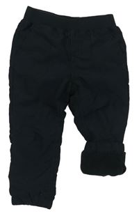 Černé šusťákové zateplené kalhoty zn. Topomini