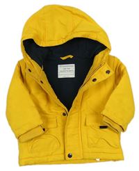 Žlutá šusťáková zimní bunda s kapucí zn. Primark