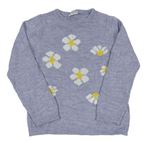 Lila sveter s kvetmi