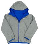 Modrá šusťáková oboustranná jarní zateplená bunda s kapucí zn. Nike
